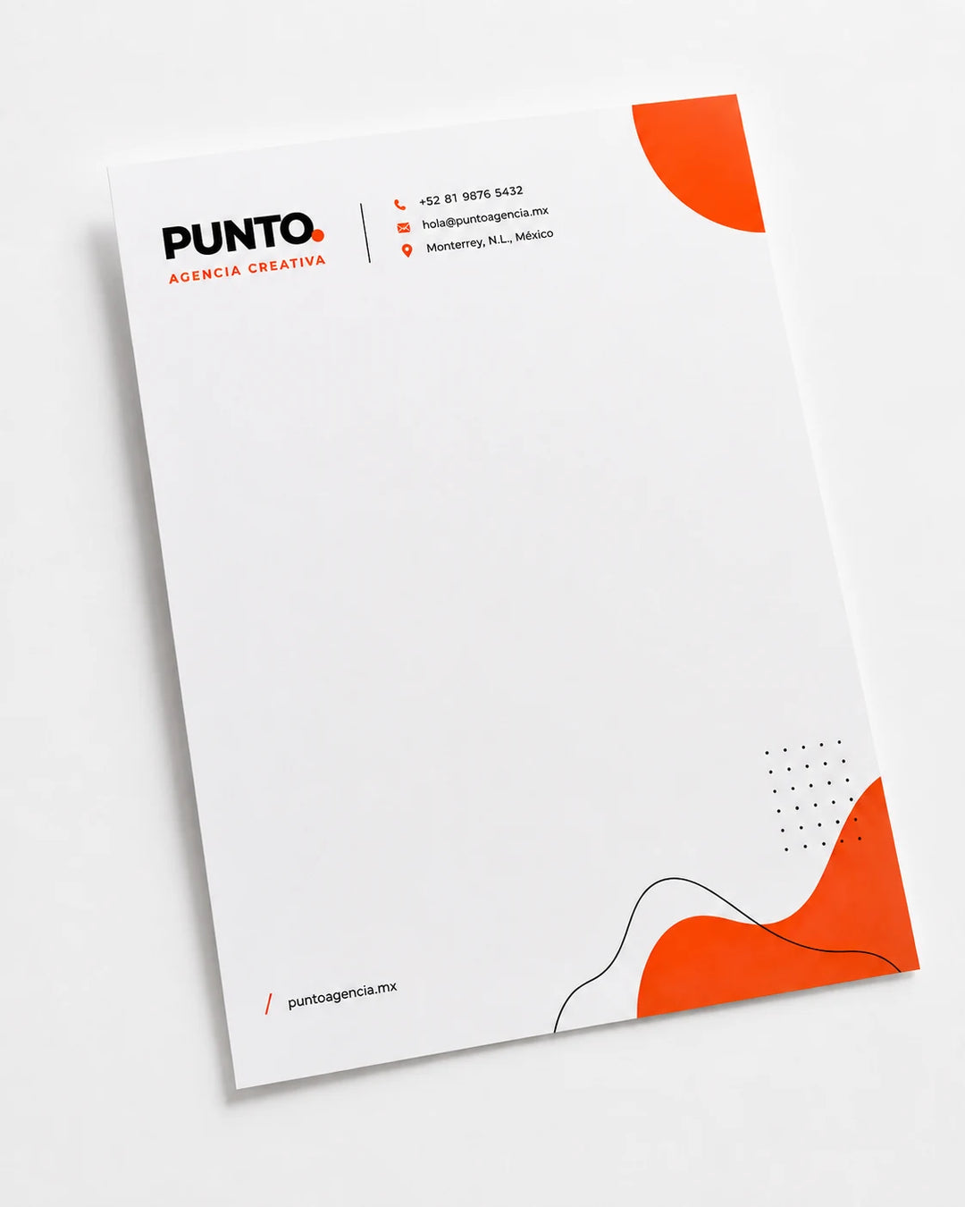 Hoja membretada personalizada de Punto Agencia Creativa en papel bond.
